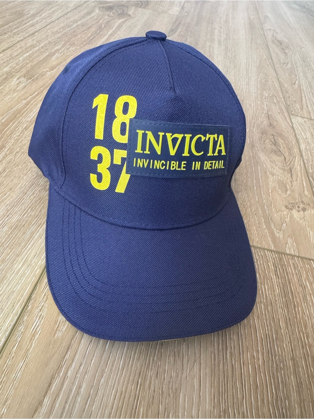 Invicta Navy Blue Baseball Cap with Yellow Logo. SnapBack one size. NWOT